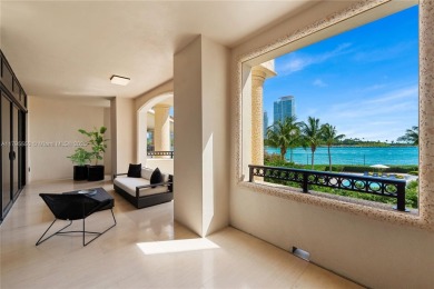 LUXURY IN MINIMALISM DESIGNED IN ELEGANT HUES OF GRAY  TAUPES IN on Fisher Island Club in Florida - for sale on GolfHomes.com, golf home, golf lot