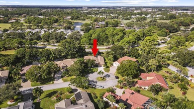 Nestled on a serene culdesac, this beautifully updated home on St. Lucie Trail Golf Club in Florida - for sale on GolfHomes.com, golf home, golf lot