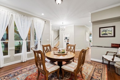 Nestled beneath a canopy of mature trees and overlooking the on Slick Rock Golf Course - Horseshoe Bay in Texas - for sale on GolfHomes.com, golf home, golf lot