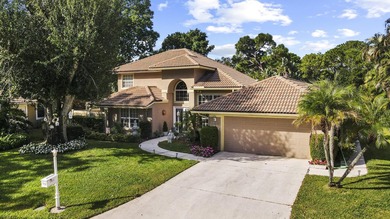 Nestled on a serene culdesac, this beautifully updated home on St. Lucie Trail Golf Club in Florida - for sale on GolfHomes.com, golf home, golf lot