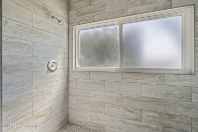 Wake up to the sound of waves in this 3-story, 3 bed, 3 bath on Spessard Holland Golf Course in Florida - for sale on GolfHomes.com, golf home, golf lot