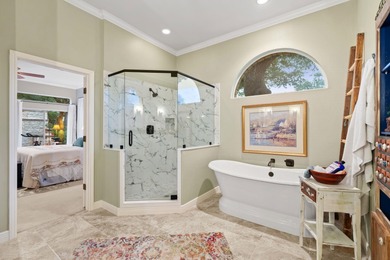 Nestled beneath a canopy of mature trees and overlooking the on Slick Rock Golf Course - Horseshoe Bay in Texas - for sale on GolfHomes.com, golf home, golf lot