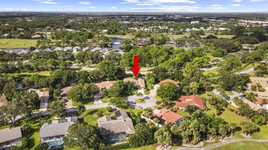 Nestled on a serene culdesac, this beautifully updated home on St. Lucie Trail Golf Club in Florida - for sale on GolfHomes.com, golf home, golf lot