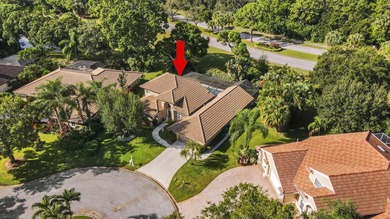 Nestled on a serene culdesac, this beautifully updated home on St. Lucie Trail Golf Club in Florida - for sale on GolfHomes.com, golf home, golf lot