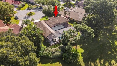 Nestled on a serene culdesac, this beautifully updated home on St. Lucie Trail Golf Club in Florida - for sale on GolfHomes.com, golf home, golf lot