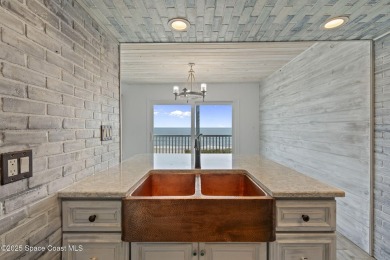 Wake up to the sound of waves in this 3-story, 3 bed, 3 bath on Spessard Holland Golf Course in Florida - for sale on GolfHomes.com, golf home, golf lot