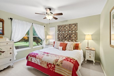 Nestled beneath a canopy of mature trees and overlooking the on Slick Rock Golf Course - Horseshoe Bay in Texas - for sale on GolfHomes.com, golf home, golf lot