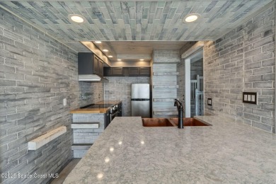 Wake up to the sound of waves in this 3-story, 3 bed, 3 bath on Spessard Holland Golf Course in Florida - for sale on GolfHomes.com, golf home, golf lot