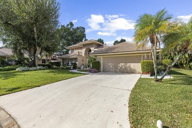 Nestled on a serene culdesac, this beautifully updated home on St. Lucie Trail Golf Club in Florida - for sale on GolfHomes.com, golf home, golf lot