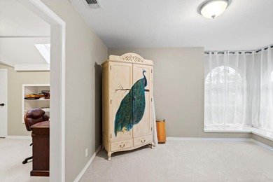 Nestled beneath a canopy of mature trees and overlooking the on Slick Rock Golf Course - Horseshoe Bay in Texas - for sale on GolfHomes.com, golf home, golf lot