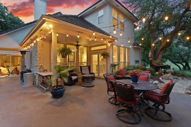 Nestled beneath a canopy of mature trees and overlooking the on Slick Rock Golf Course - Horseshoe Bay in Texas - for sale on GolfHomes.com, golf home, golf lot