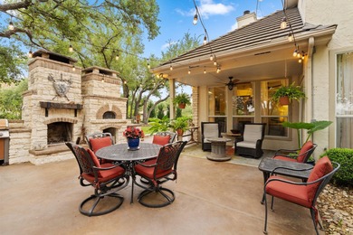 Nestled beneath a canopy of mature trees and overlooking the on Slick Rock Golf Course - Horseshoe Bay in Texas - for sale on GolfHomes.com, golf home, golf lot