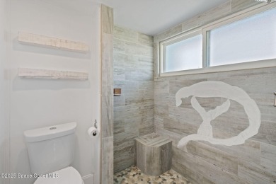 Wake up to the sound of waves in this 3-story, 3 bed, 3 bath on Spessard Holland Golf Course in Florida - for sale on GolfHomes.com, golf home, golf lot