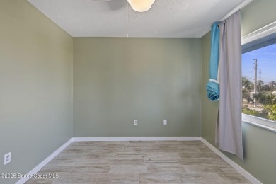 Wake up to the sound of waves in this 3-story, 3 bed, 3 bath on Spessard Holland Golf Course in Florida - for sale on GolfHomes.com, golf home, golf lot