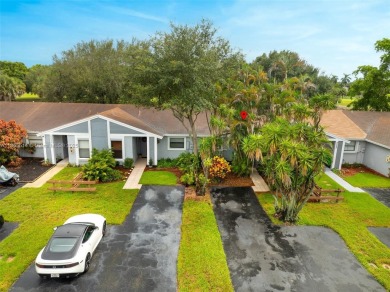 Welcome to Redbridge! This beautifully maintained single-story on Springtree Country Club in Florida - for sale on GolfHomes.com, golf home, golf lot