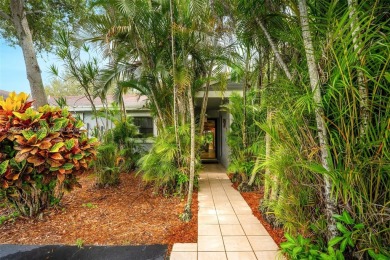 Welcome to Redbridge! This beautifully maintained single-story on Springtree Country Club in Florida - for sale on GolfHomes.com, golf home, golf lot