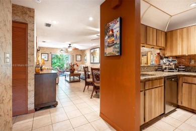 Welcome to Redbridge! This beautifully maintained single-story on Springtree Country Club in Florida - for sale on GolfHomes.com, golf home, golf lot