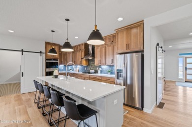 The Magnolia offers a spacious layout with 3598 sqft, 5 bedroom on Prairie Falls Golf Club in Idaho - for sale on GolfHomes.com, golf home, golf lot