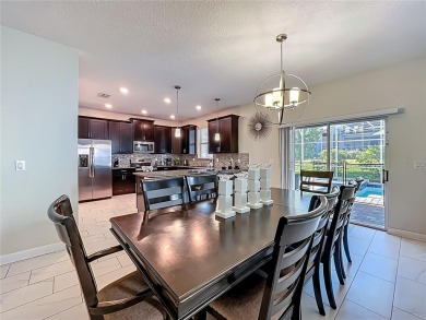 WALKING DISTANCE TO THE CLUBHOUSE. This beautifully designed on The Oasis Club at Champions Gate in Florida - for sale on GolfHomes.com, golf home, golf lot