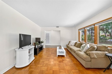 Come see this well-maintained 3-bedroom, 2.5-bath midcentury on Temple Terrace Golf and Country Club in Florida - for sale on GolfHomes.com, golf home, golf lot