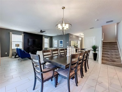 WALKING DISTANCE TO THE CLUBHOUSE. This beautifully designed on The Oasis Club at Champions Gate in Florida - for sale on GolfHomes.com, golf home, golf lot