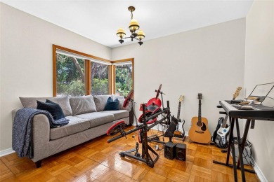 Come see this well-maintained 3-bedroom, 2.5-bath midcentury on Temple Terrace Golf and Country Club in Florida - for sale on GolfHomes.com, golf home, golf lot