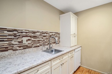 This beautifully maintained Greenbriar model is located in a on Leisure Village Golf Course in New York - for sale on GolfHomes.com, golf home, golf lot