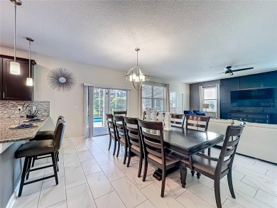 WALKING DISTANCE TO THE CLUBHOUSE. This beautifully designed on The Oasis Club at Champions Gate in Florida - for sale on GolfHomes.com, golf home, golf lot