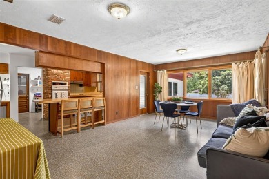 Come see this well-maintained 3-bedroom, 2.5-bath midcentury on Temple Terrace Golf and Country Club in Florida - for sale on GolfHomes.com, golf home, golf lot