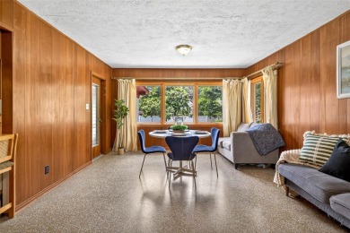 Come see this well-maintained 3-bedroom, 2.5-bath midcentury on Temple Terrace Golf and Country Club in Florida - for sale on GolfHomes.com, golf home, golf lot