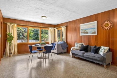 Come see this well-maintained 3-bedroom, 2.5-bath midcentury on Temple Terrace Golf and Country Club in Florida - for sale on GolfHomes.com, golf home, golf lot
