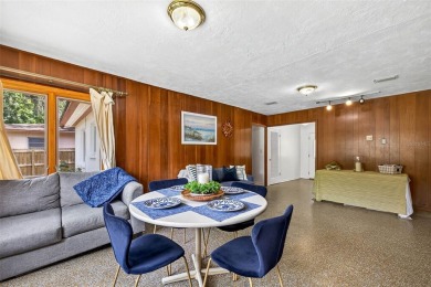Come see this well-maintained 3-bedroom, 2.5-bath midcentury on Temple Terrace Golf and Country Club in Florida - for sale on GolfHomes.com, golf home, golf lot