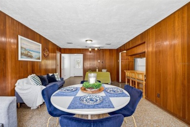 Come see this well-maintained 3-bedroom, 2.5-bath midcentury on Temple Terrace Golf and Country Club in Florida - for sale on GolfHomes.com, golf home, golf lot