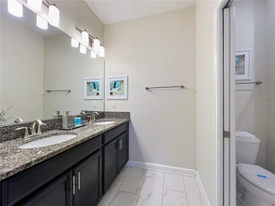 WALKING DISTANCE TO THE CLUBHOUSE. This beautifully designed on The Oasis Club at Champions Gate in Florida - for sale on GolfHomes.com, golf home, golf lot