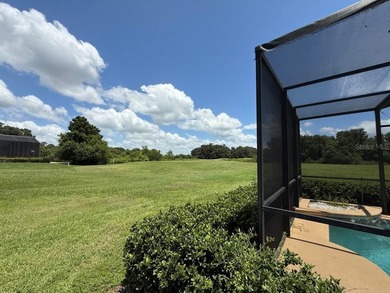 Rarely used 5 Bed/4 Bath POOL Home in GATED Community with GOLF on Kissimmee Bay Country Club in Florida - for sale on GolfHomes.com, golf home, golf lot