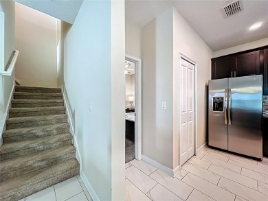 WALKING DISTANCE TO THE CLUBHOUSE. This beautifully designed on The Oasis Club at Champions Gate in Florida - for sale on GolfHomes.com, golf home, golf lot