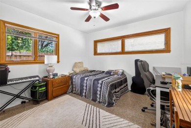 Come see this well-maintained 3-bedroom, 2.5-bath midcentury on Temple Terrace Golf and Country Club in Florida - for sale on GolfHomes.com, golf home, golf lot