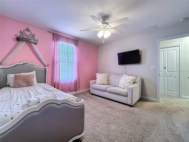WALKING DISTANCE TO THE CLUBHOUSE. This beautifully designed on The Oasis Club at Champions Gate in Florida - for sale on GolfHomes.com, golf home, golf lot