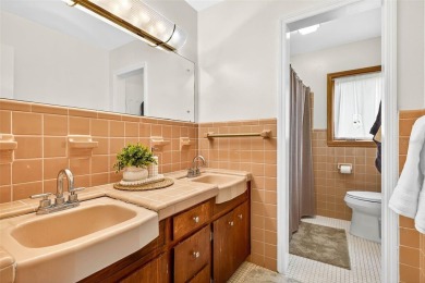 Come see this well-maintained 3-bedroom, 2.5-bath midcentury on Temple Terrace Golf and Country Club in Florida - for sale on GolfHomes.com, golf home, golf lot