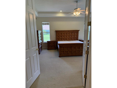 Rarely used 5 Bed/4 Bath POOL Home in GATED Community with GOLF on Kissimmee Bay Country Club in Florida - for sale on GolfHomes.com, golf home, golf lot