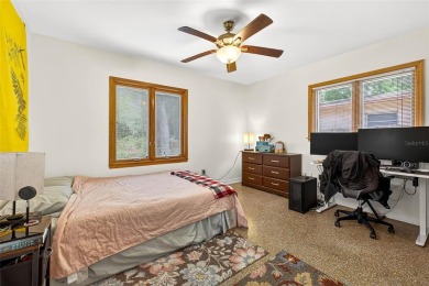 Come see this well-maintained 3-bedroom, 2.5-bath midcentury on Temple Terrace Golf and Country Club in Florida - for sale on GolfHomes.com, golf home, golf lot