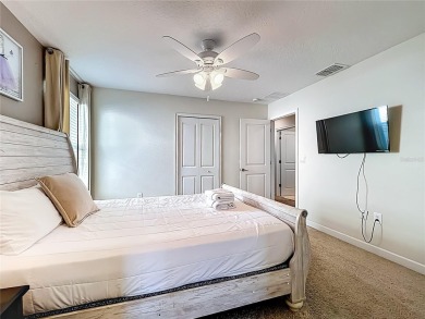 WALKING DISTANCE TO THE CLUBHOUSE. This beautifully designed on The Oasis Club at Champions Gate in Florida - for sale on GolfHomes.com, golf home, golf lot