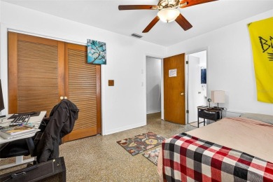 Come see this well-maintained 3-bedroom, 2.5-bath midcentury on Temple Terrace Golf and Country Club in Florida - for sale on GolfHomes.com, golf home, golf lot