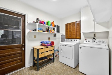 Come see this well-maintained 3-bedroom, 2.5-bath midcentury on Temple Terrace Golf and Country Club in Florida - for sale on GolfHomes.com, golf home, golf lot