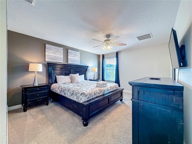 WALKING DISTANCE TO THE CLUBHOUSE. This beautifully designed on The Oasis Club at Champions Gate in Florida - for sale on GolfHomes.com, golf home, golf lot