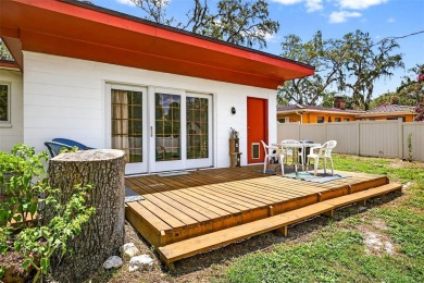 Come see this well-maintained 3-bedroom, 2.5-bath midcentury on Temple Terrace Golf and Country Club in Florida - for sale on GolfHomes.com, golf home, golf lot