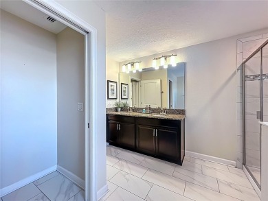 WALKING DISTANCE TO THE CLUBHOUSE. This beautifully designed on The Oasis Club at Champions Gate in Florida - for sale on GolfHomes.com, golf home, golf lot