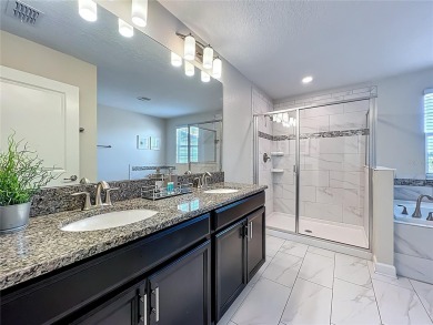 WALKING DISTANCE TO THE CLUBHOUSE. This beautifully designed on The Oasis Club at Champions Gate in Florida - for sale on GolfHomes.com, golf home, golf lot