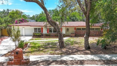 Come see this well-maintained 3-bedroom, 2.5-bath midcentury on Temple Terrace Golf and Country Club in Florida - for sale on GolfHomes.com, golf home, golf lot