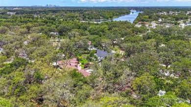 Come see this well-maintained 3-bedroom, 2.5-bath midcentury on Temple Terrace Golf and Country Club in Florida - for sale on GolfHomes.com, golf home, golf lot